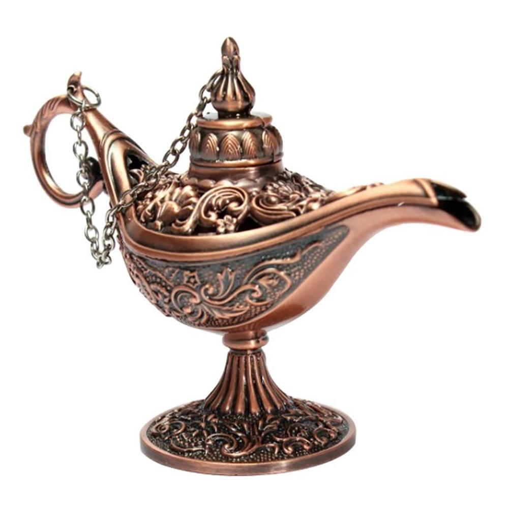 A lâmpada mágica do Aladdin antigo. Lâmpada de prata Genie na mesa de  madeira. Lâmpada de óleo de estilo antigo fotos, imagens de © iancucristi  #53053483